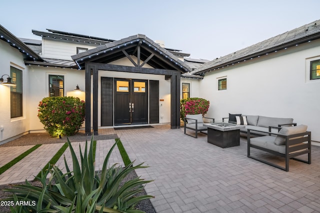 view of patio with an outdoor fire pit