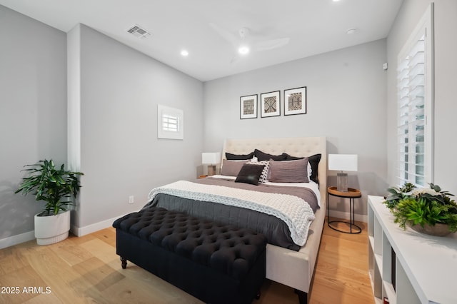 bedroom with light hardwood / wood-style floors