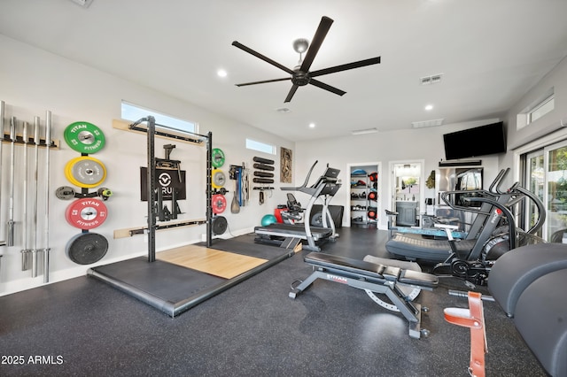 exercise room with ceiling fan