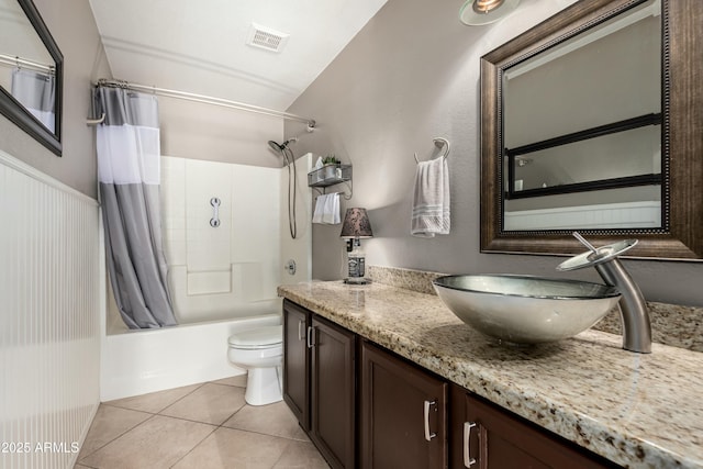 bathroom with tile patterned flooring, visible vents, toilet, shower / bath combination with curtain, and vanity