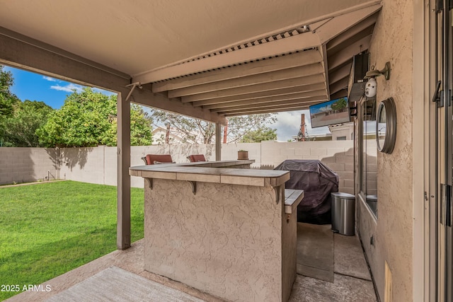 view of patio with a fenced backyard