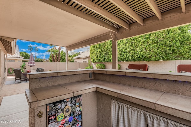 view of patio with a fenced backyard