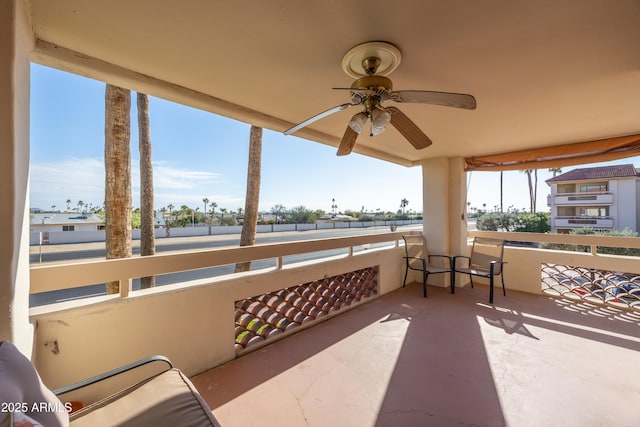 balcony featuring ceiling fan