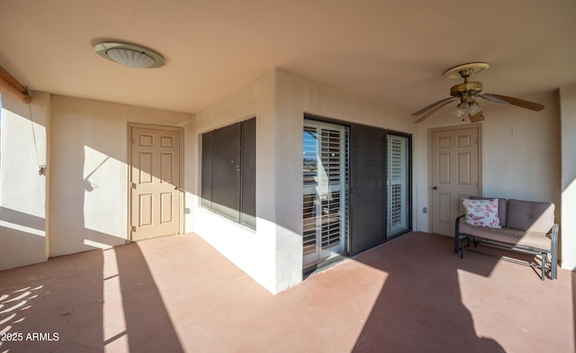view of patio featuring ceiling fan