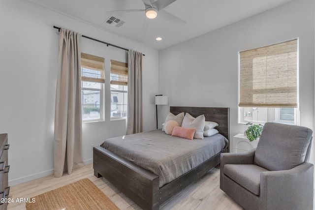 bedroom featuring ceiling fan and light wood-type flooring