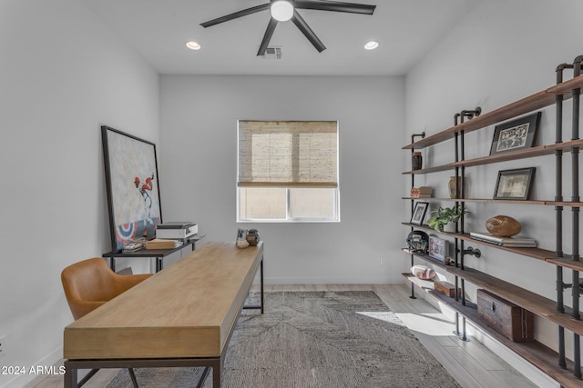 office area featuring ceiling fan and light hardwood / wood-style floors