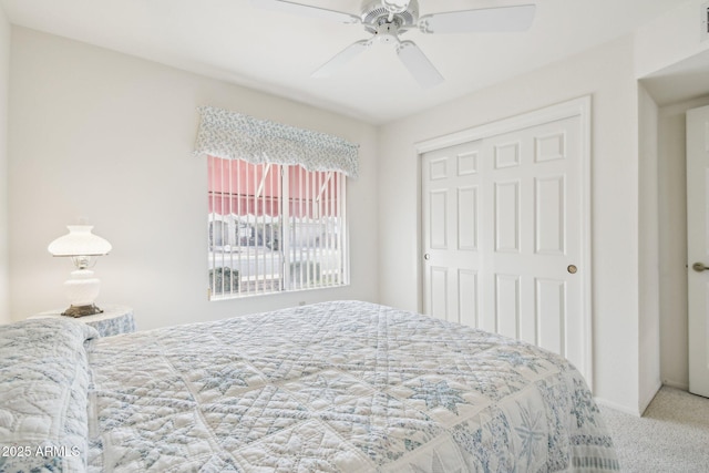 bedroom with ceiling fan, a closet, and carpet