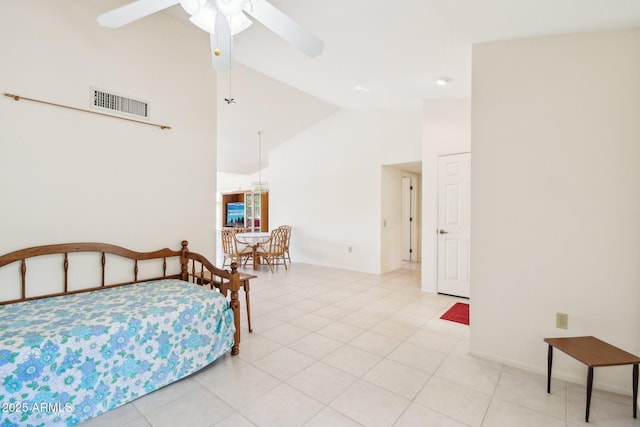 bedroom featuring light tile patterned floors, high vaulted ceiling, visible vents, and a ceiling fan