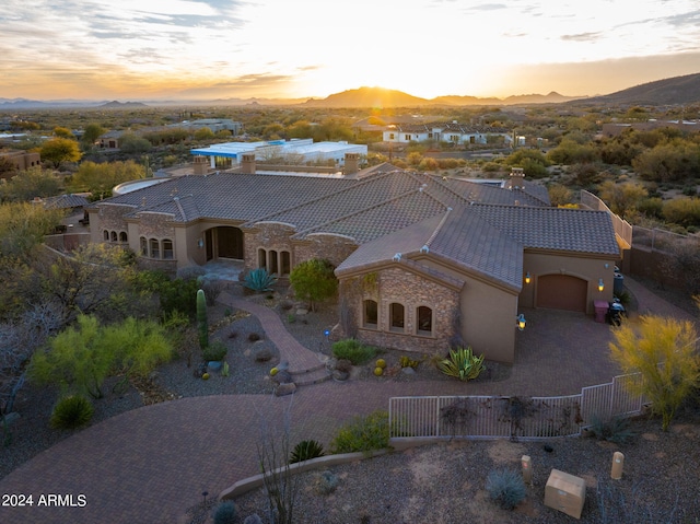 aerial view at dusk with a mountain view