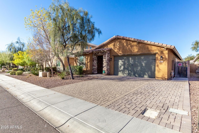 view of front of property featuring a garage