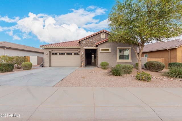 view of front of home with a garage