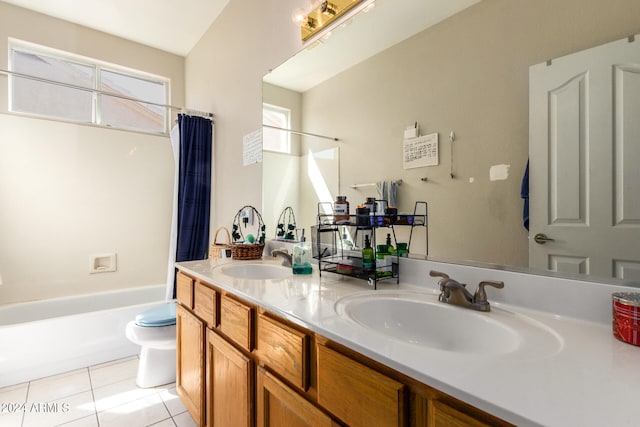 full bathroom with vanity, tile patterned floors, toilet, and shower / tub combo with curtain