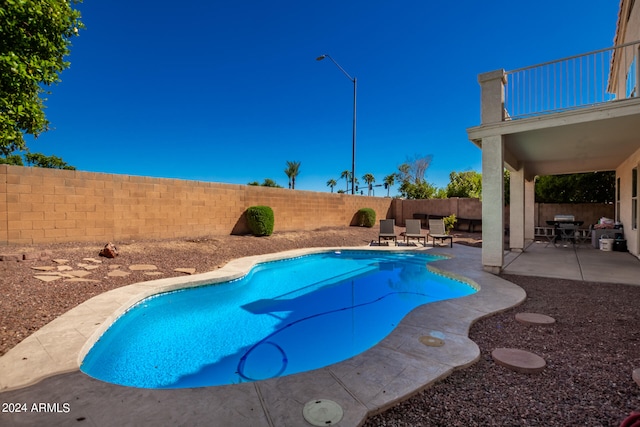 view of pool with a patio area