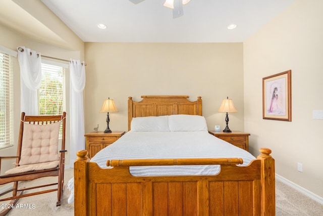 carpeted bedroom with ceiling fan