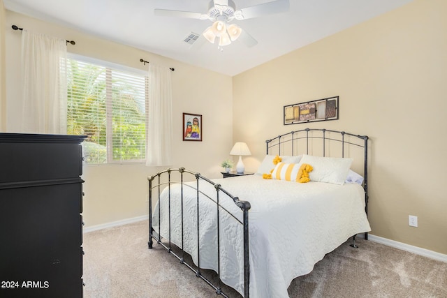 carpeted bedroom featuring ceiling fan