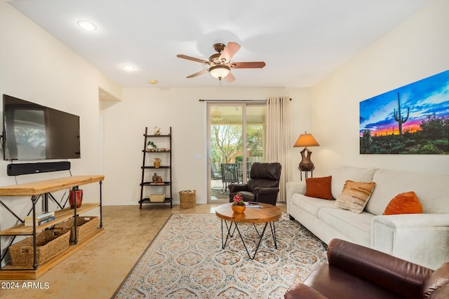 living room featuring ceiling fan and light tile patterned flooring