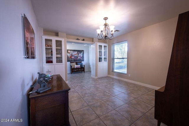 interior space featuring a notable chandelier