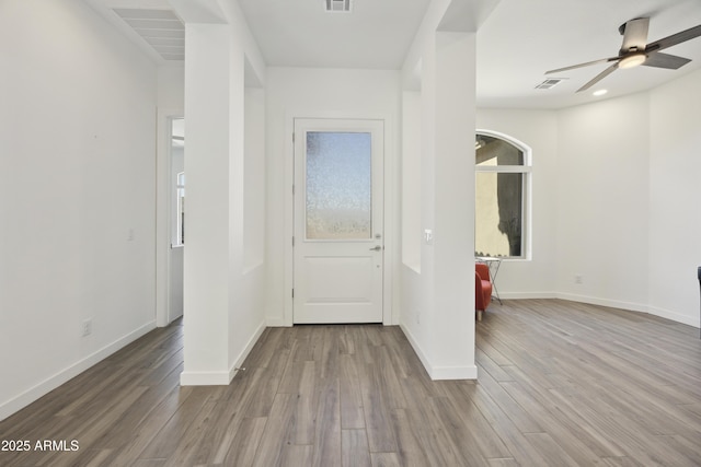 10540 S 32nd Dr, Laveen, AZ 85339 - entrance foyer with wood finished floors, ceiling fan, and baseboards