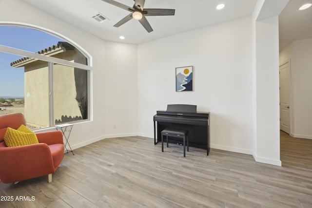 10540 S 32nd Dr, Laveen, AZ 85339 - living area featuring ceiling fan, wood finished floors, recessed lighting, and baseboards