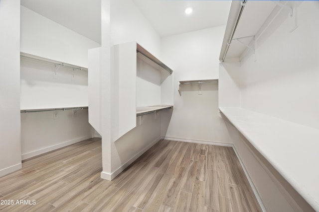 10540 S 32nd Dr, Laveen, AZ 85339 - spacious closet with light wood finished floors