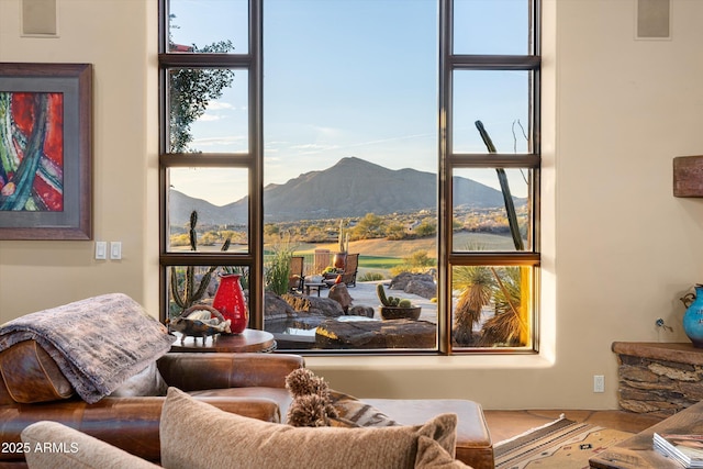 interior space featuring a wealth of natural light and a mountain view