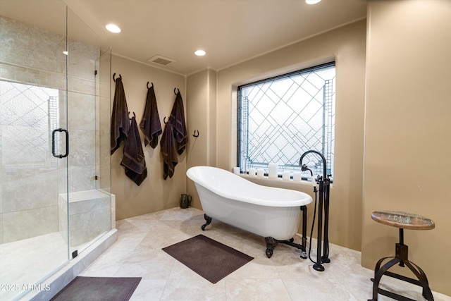 full bath with tile patterned flooring, recessed lighting, visible vents, a freestanding bath, and a shower stall