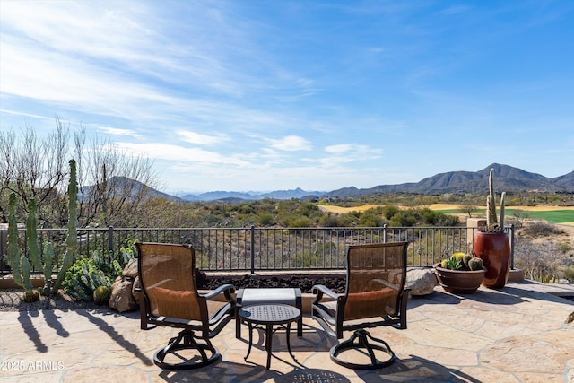 view of patio with a mountain view