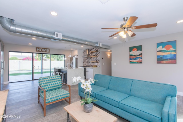 7544 E Mckinley St, Scottsdale, AZ 85257 - living area with recessed lighting, ceiling fan, wood finished floors, and visible vents