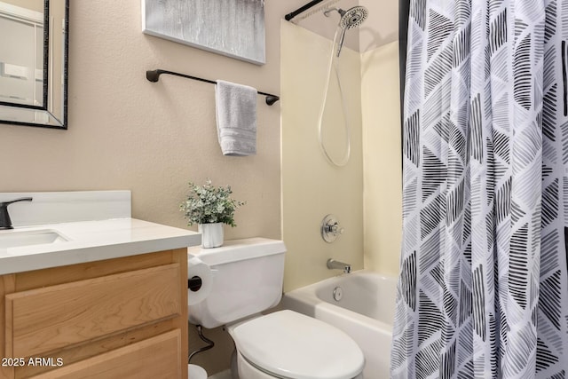 full bathroom featuring toilet, shower / bath combo, and vanity