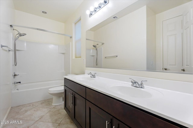 full bathroom featuring vanity, tub / shower combination, tile patterned floors, and toilet