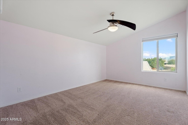 additional living space featuring vaulted ceiling, carpet floors, and ceiling fan