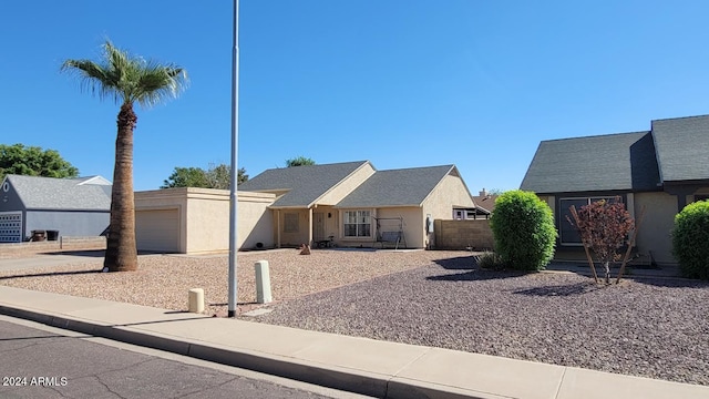 view of front of home featuring a garage