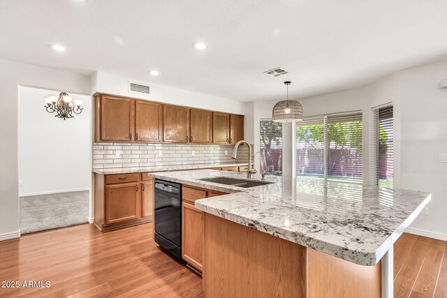664 E Windsor Dr, Gilbert, AZ 85296 - kitchen with dishwasher, a sink, light wood finished floors, backsplash, and a large island with sink