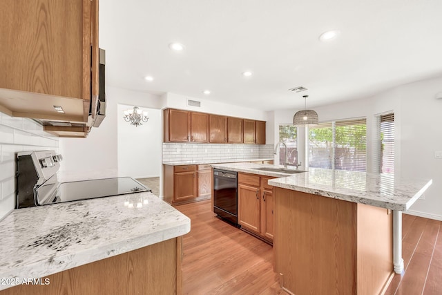 664 E Windsor Dr, Gilbert, AZ 85296 - kitchen with dishwasher, range, a sink, light wood finished floors, and decorative backsplash