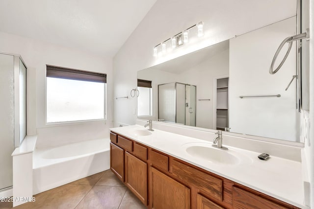 664 E Windsor Dr, Gilbert, AZ 85296 - full bath with a bath, lofted ceiling, a stall shower, double vanity, and tile patterned flooring