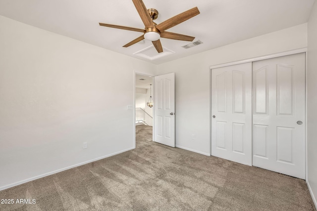 664 E Windsor Dr, Gilbert, AZ 85296 - unfurnished bedroom with carpet flooring, baseboards, a closet, and ceiling fan