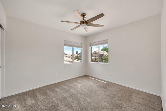 664 E Windsor Dr, Gilbert, AZ 85296 - carpeted empty room with ceiling fan and baseboards