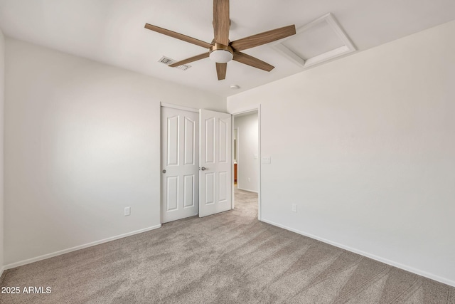 664 E Windsor Dr, Gilbert, AZ 85296 - unfurnished bedroom with attic access, carpet, baseboards, and a closet