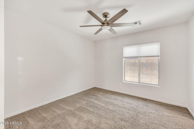 664 E Windsor Dr, Gilbert, AZ 85296 - spare room with a ceiling fan, carpet, and baseboards