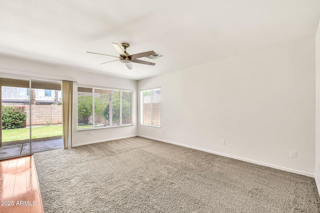 664 E Windsor Dr, Gilbert, AZ 85296 - carpeted empty room with a ceiling fan, healthy amount of natural light, and baseboards