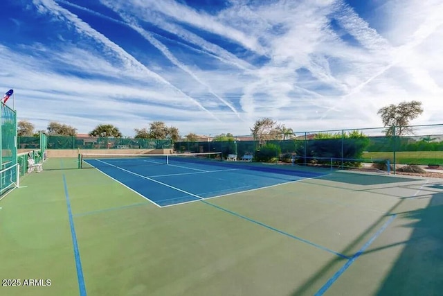 view of sport court featuring basketball hoop