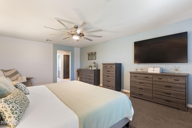 bedroom featuring dark colored carpet and ceiling fan