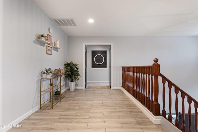 corridor featuring light hardwood / wood-style flooring