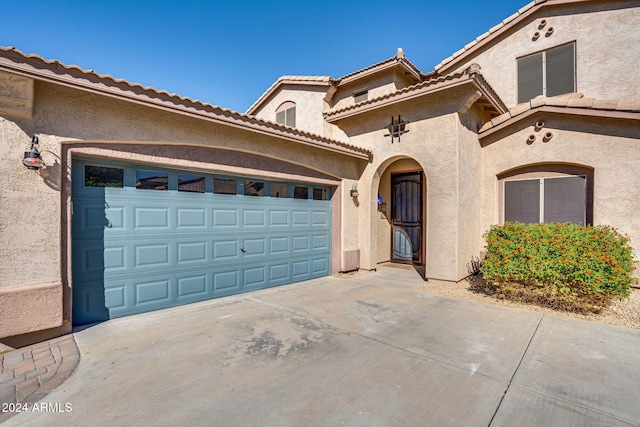 view of front of house with a garage