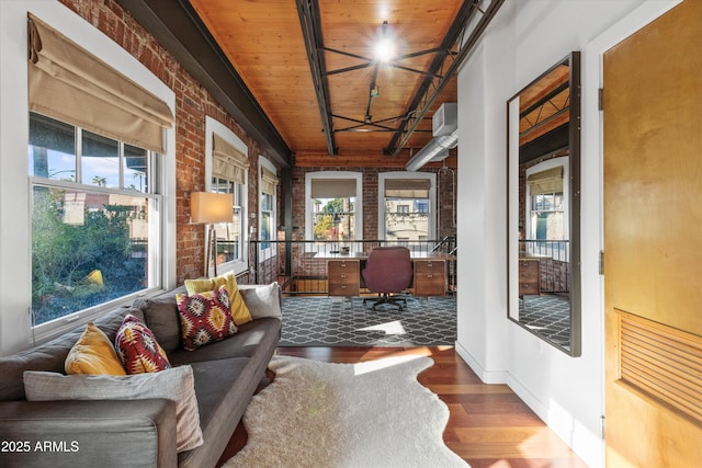 sunroom featuring wooden ceiling