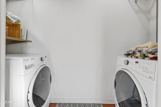 laundry room with washer and dryer