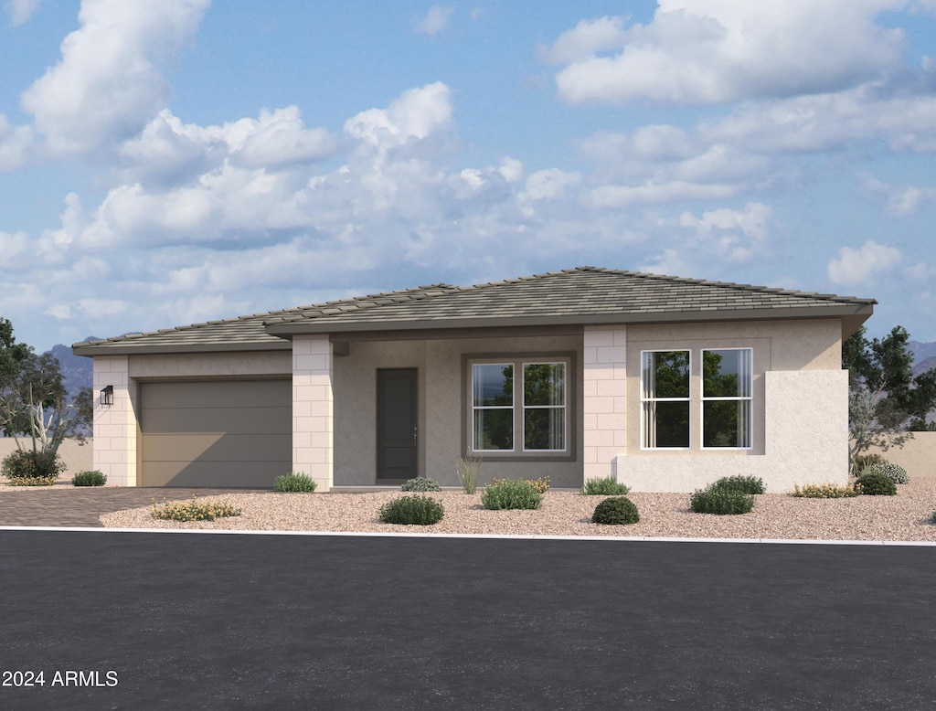 view of front of home with a garage