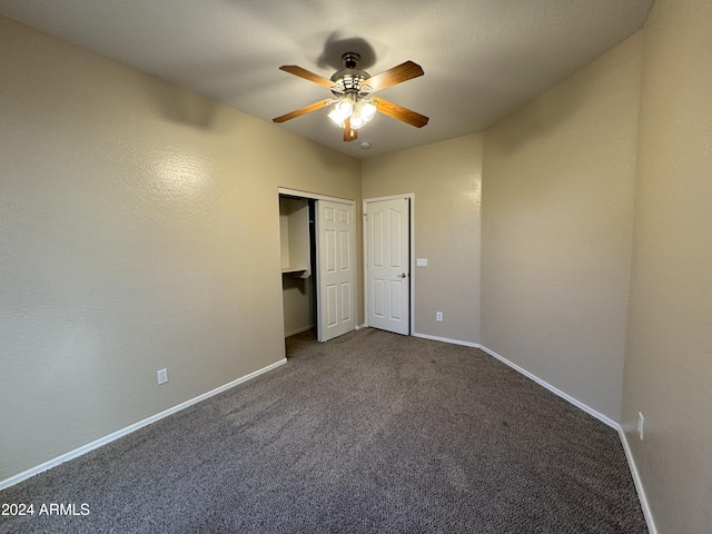 unfurnished bedroom featuring carpet and ceiling fan