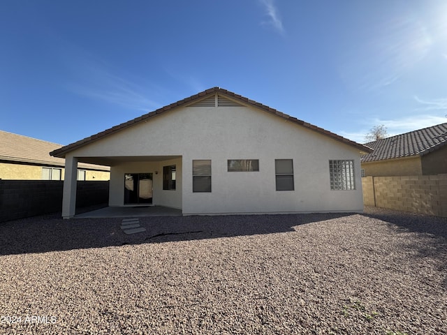 back of house featuring a patio