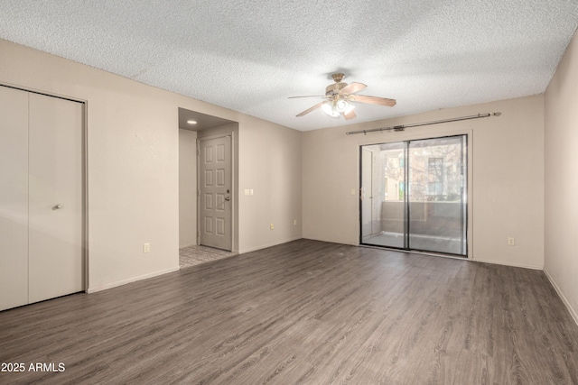 2146 W Isabella Ave Unit 131, Mesa, AZ 85202 - interior space with baseboards, a ceiling fan, wood finished floors, and a textured ceiling